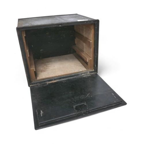 386 - A black painted strong box, missing its key, 46 by 55 by 43cm high.