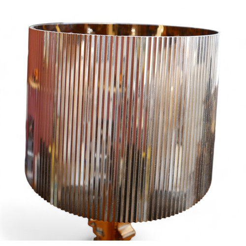 390 - A Kartell Bourgie perspex table lamp, copper finish, designed by Ferruccio Laviani, 32 by 69cm high.