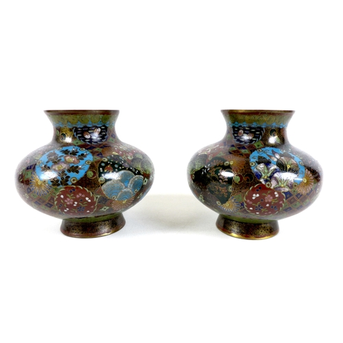 174 - A pair of Chinese cloisonne vases, early to mid 20th century, decorated with variously coloured pane... 