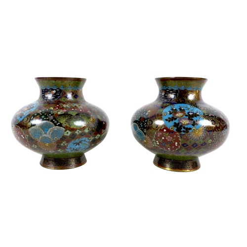 174 - A pair of Chinese cloisonne vases, early to mid 20th century, decorated with variously coloured pane... 