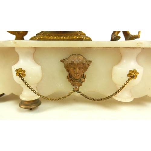 342 - A 19th century ormolu and white marble figural mantel clock, for restoration. 35 by 12 by 34cm high.