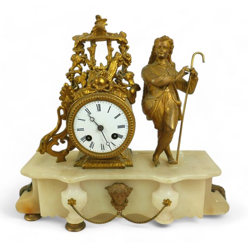 342 - A 19th century ormolu and white marble figural mantel clock, for restoration. 35 by 12 by 34cm high.