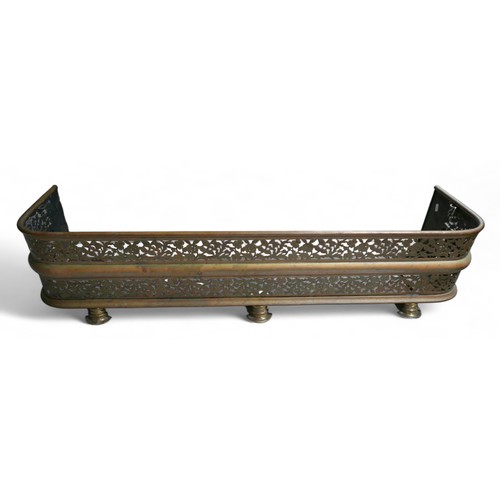 393 - A Victorian brass fire kerb, 122 by 31 by 27cm high.