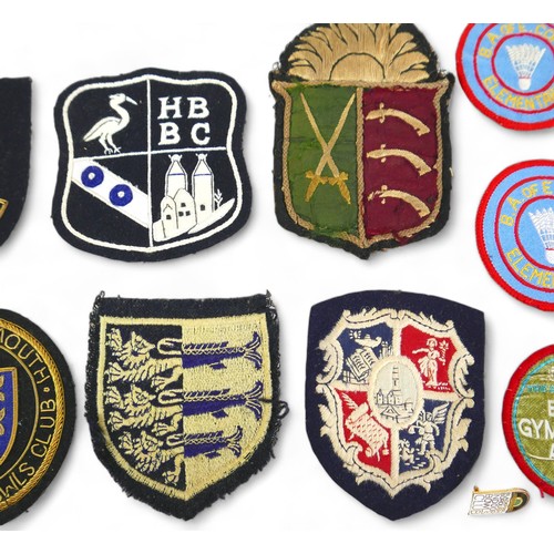 276 - A collection of pin and cloth badges, including some militaria, 'Fleet Air Arm', as well as a number... 