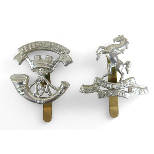 317 - A collection of seven cap badges, including a British Army King's Royal Rifle Corp cap badge, an Arg... 