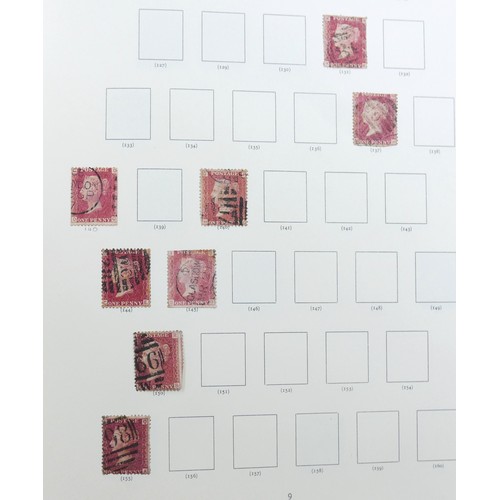 307 - A group of four stamp albums including Victorian and later stamps, including two Stanley Gibbons alb... 