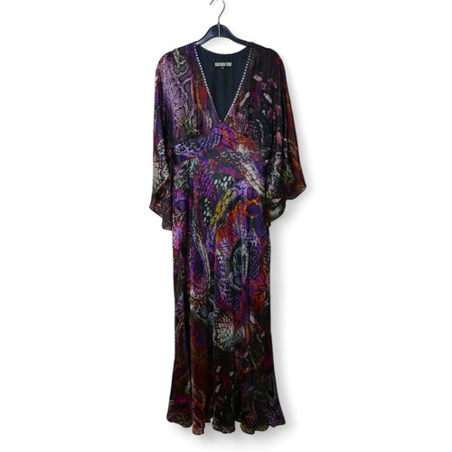 269 - A late 20th century Biba dress, size 12, purple snakeskin effect design on black ground, 140cm neck ... 