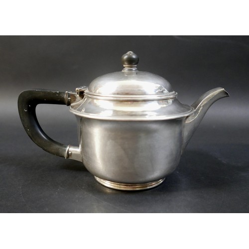 36 - An Arts and Crafts style silver hammered teapot, by Hart Silversmiths - Guild of Handicraft, marked ... 