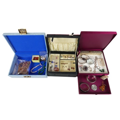 73 - A collection of silver and costume jewellery in three jewellery boxes. (3)