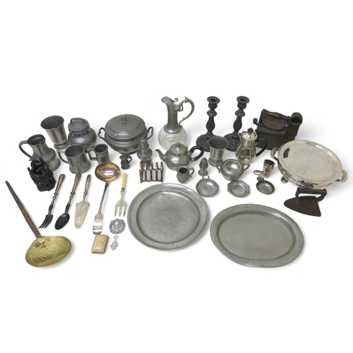 376 - A collection of metal wares, including pewter and silver plated items, a large brass pierced spoon, ... 