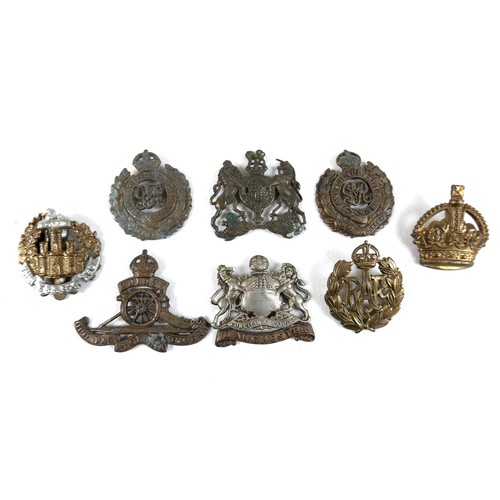 318 - A collection of thirty five military badges and buttons, together with a nurses lapel badge. (36)