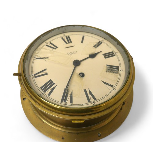 344 - A Smith Astral brass ships bulkhead clock, 26 by 10cm.