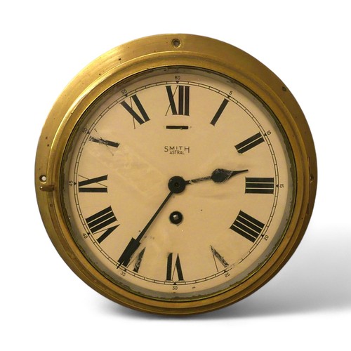 344 - A Smith Astral brass ships bulkhead clock, 26 by 10cm.