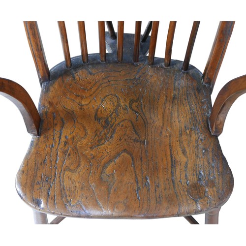 535 - An 18th century yew and elm Windsor armchair, crinoline stretcher, 53.5 by 47 by 88cm high.