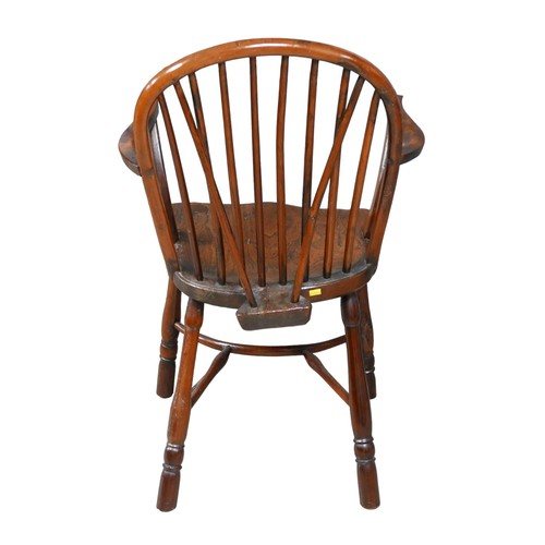 535 - An 18th century yew and elm Windsor armchair, crinoline stretcher, 53.5 by 47 by 88cm high.