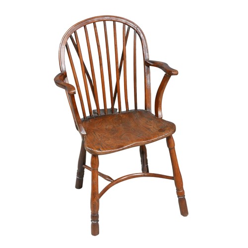 535 - An 18th century yew and elm Windsor armchair, crinoline stretcher, 53.5 by 47 by 88cm high.