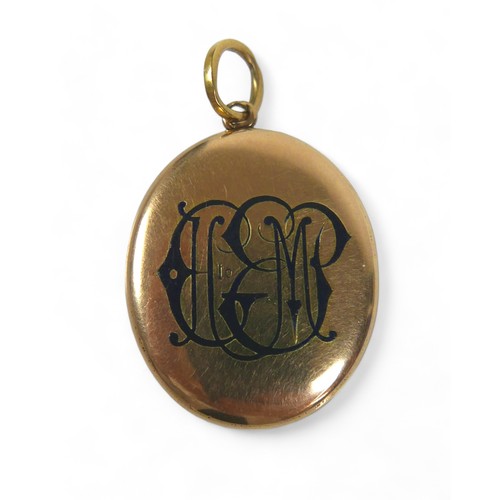 143 - A yellow gold globe link necklace (broken) with a gilt metal locket, chain tests to 18ct on the clas... 