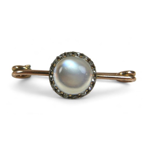 114 - A small group of jewellery, comprising a  gold moonstone and diamond brooch, a 9ct gold safety pin a... 