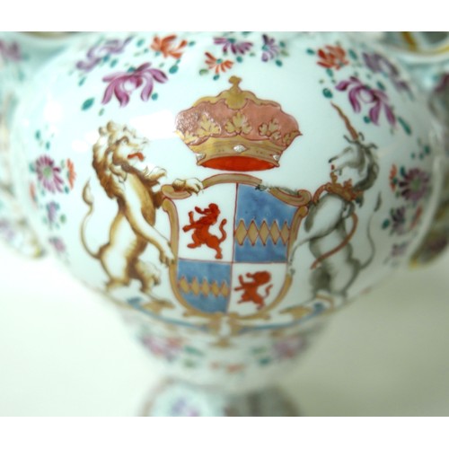 218 - A 19th century Porcelain de Paris twin handle lidded vase, decorated with floral sprays and white tu... 