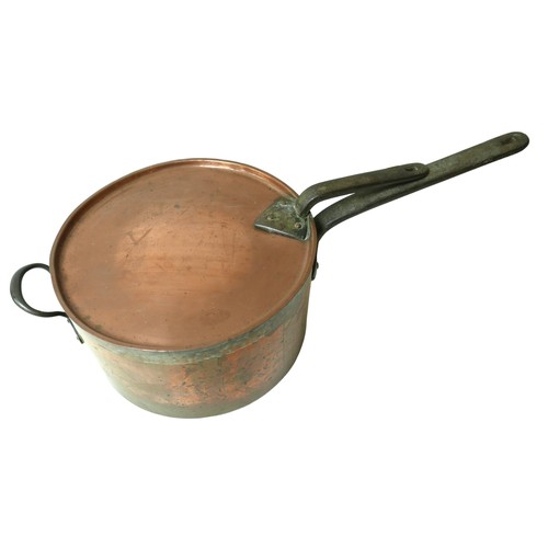 365 - A large 19th century country house copper and cast iron lidded cooking pan, 77 by 37 by 24cm high.