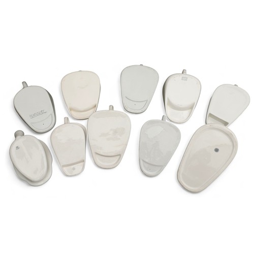 202 - A group of ten antique ceramic bedpans, of various different Slipper form, including the 'Meritor' a... 