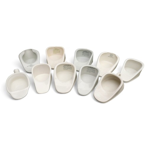 202 - A group of ten antique ceramic bedpans, of various different Slipper form, including the 'Meritor' a... 