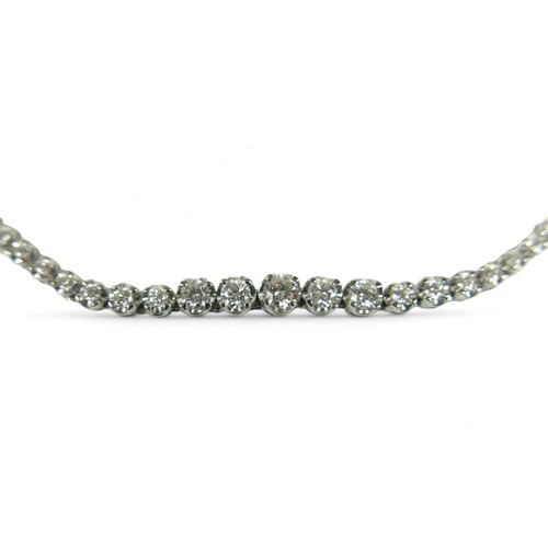 152 - A diamond and 18ct white gold graduated riviere necklace, by Heidi Kjeldsen, comprising 140 diamonds... 