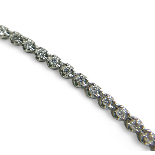 152 - A diamond and 18ct white gold graduated riviere necklace, by Heidi Kjeldsen, comprising 140 diamonds... 