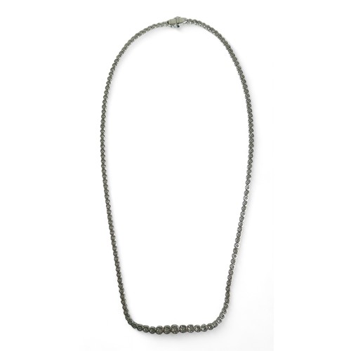 152 - A diamond and 18ct white gold graduated riviere necklace, by Heidi Kjeldsen, comprising 140 diamonds... 