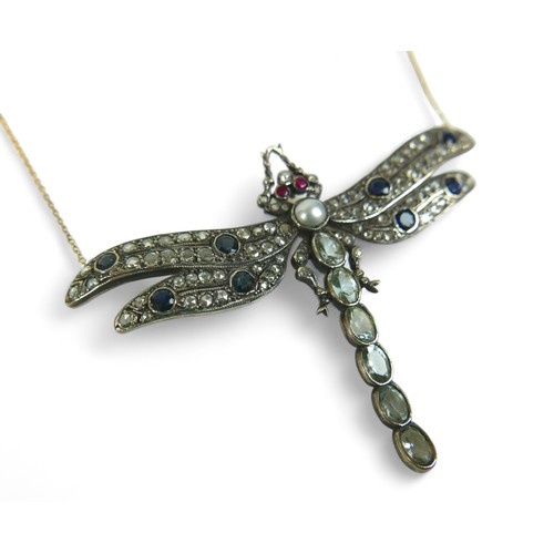 149 - A diamond, sapphire, ruby and aquamarine necklace, formed as a dragonfly, on trace link gold chain, ... 