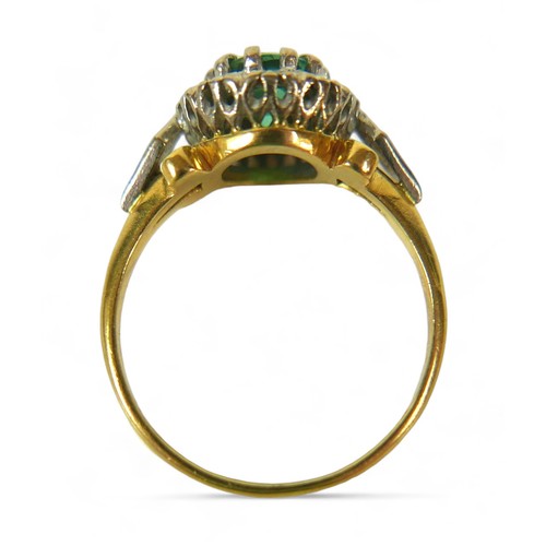 130 - A diamond and green stone flowerhead cluster ring, possibly green tourmaline, the round-cut central ... 