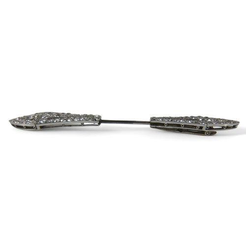 150 - An Art Deco diamond jabot pin, approximately 112 round cut diamonds, largest unmarked white metal mo... 