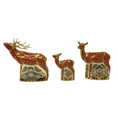 242 - Three limited edition Royal Crown Derby paperweights comprising Red Stag no.391 of 395, Sherwood Hin... 