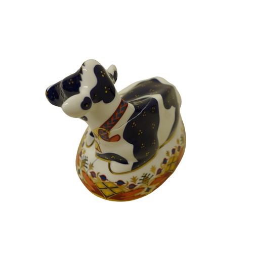 207 - Two boxed Royal Crown Derby paperweights, 'Buttercup' Friesian Cow, a/f, 'Bluebell' Calf, both with ... 