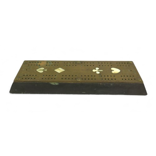 325 - A brass cribbage board, inset with bone plaques of the four suits, stamped 'The Millstone Inn' and '... 