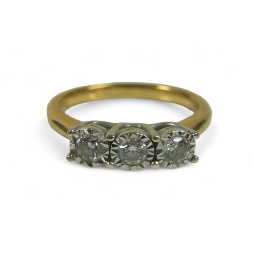 94 - A 9ct gold and three stone diamond ring, each stone brilliant cut in illusion setting, size M, 3.6g.