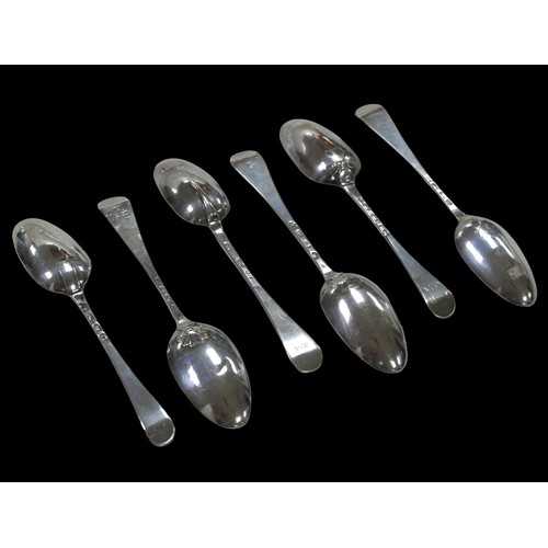 32 - Six George I and II silver Hanoverian pattern dessert spoons, comprising a George I engraved with in... 