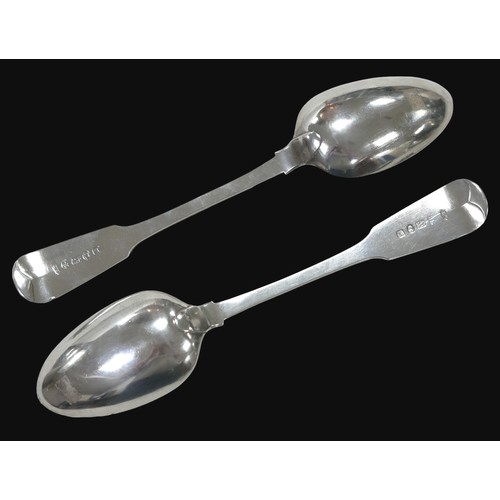 28 - A pair of George IV silver fiddle back pattern table spoons, John Wright, Newcastle 1825, each 22.8c... 