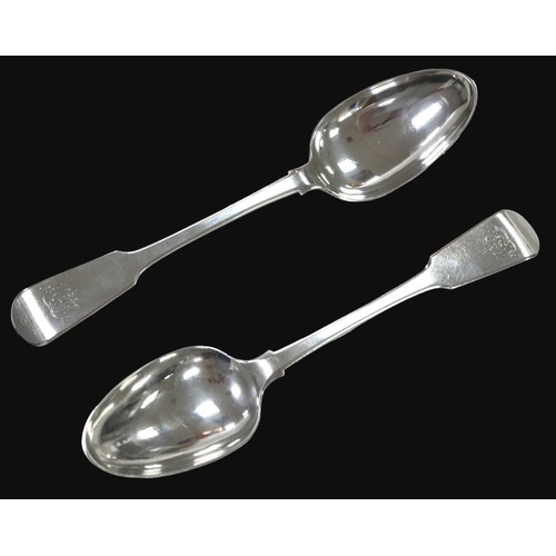 28 - A pair of George IV silver fiddle back pattern table spoons, John Wright, Newcastle 1825, each 22.8c... 