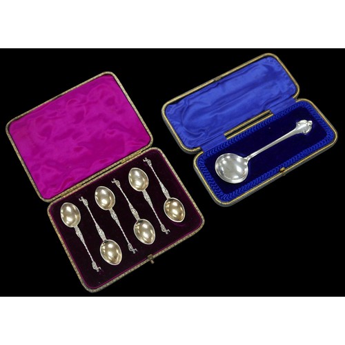 9 - Two cased sets of silver spoons, including an Edwardian dog nose spoon engraved with initials 'L.J.H... 