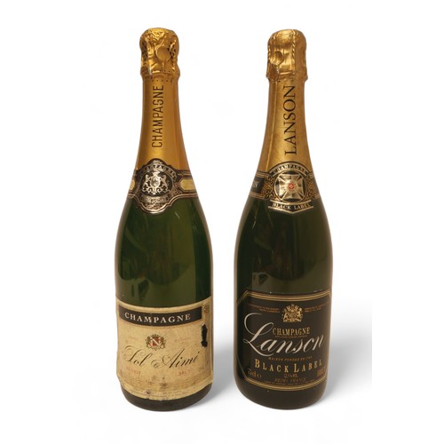 355 - Two bottles of champagne, comprising Lanson Black Label and Pol Aimee Reserve Brut Cuvee speciale. (... 