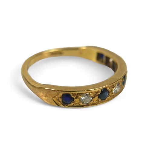 89 - Two 18ct gold dress rings, comprising a three stone illusion set diamond ring, each 
round cut stone... 