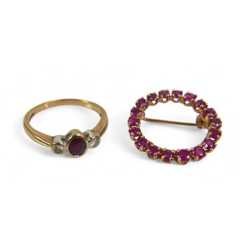 90 - Two pieces of 9ct gold jewellery, comprising a ruby and diamond ring, the central oval cut ruby, 3 b... 