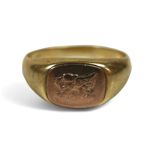 102 - Two 9ct gold signet rings, one with a dragon insignia, 4.8g, and another shield form signet ring, a/... 