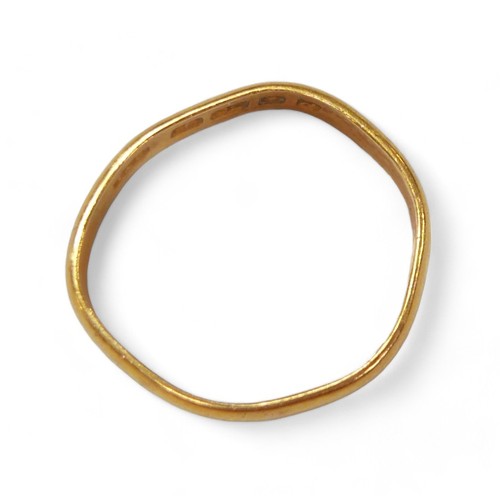 51 - A 22ct gold band, size L, 3.4g, a/f.