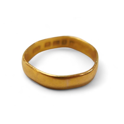 51 - A 22ct gold band, size L, 3.4g, a/f.