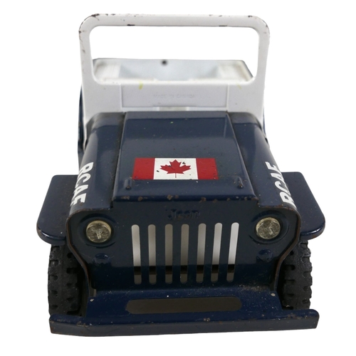 327 - A Tonka RCAF model jeep, tin plate and white plastic, in dark blue with Canadian flag to bonnet, 23.... 