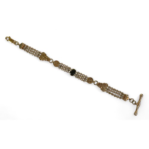 125 - A 9ct yellow gold fancy watch chain link bracelet set with a single garnet, 20.5 by 3cm, 20.2gs.