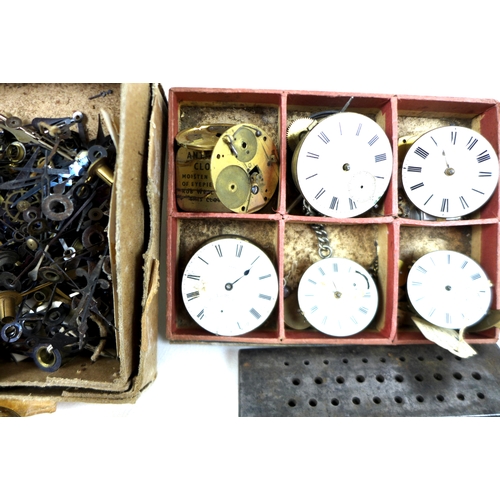 154 - A collection of watch parts and tools, including some hands and movements, some keys, gauges and acc... 