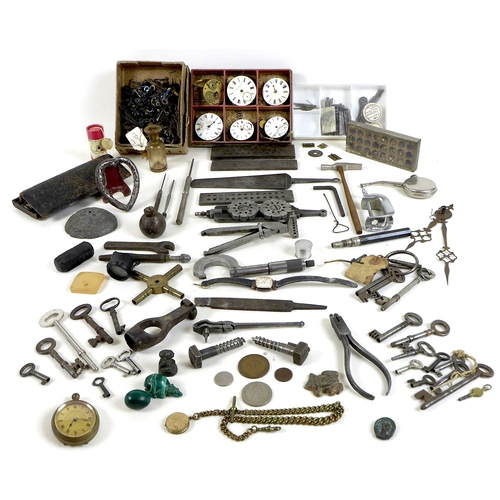 154 - A collection of watch parts and tools, including some hands and movements, some keys, gauges and acc... 